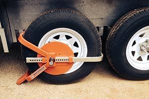 Wheel clamp secured to a Bluebox trailer